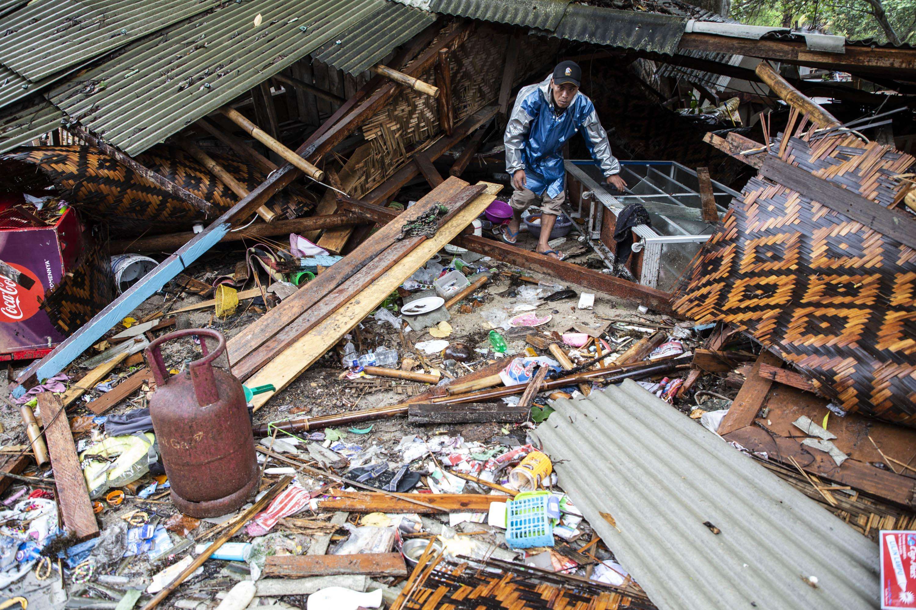 A man emerges from a building in Indonesia's Banten province, one of the areas hit by the December 22 tsunami disaster.