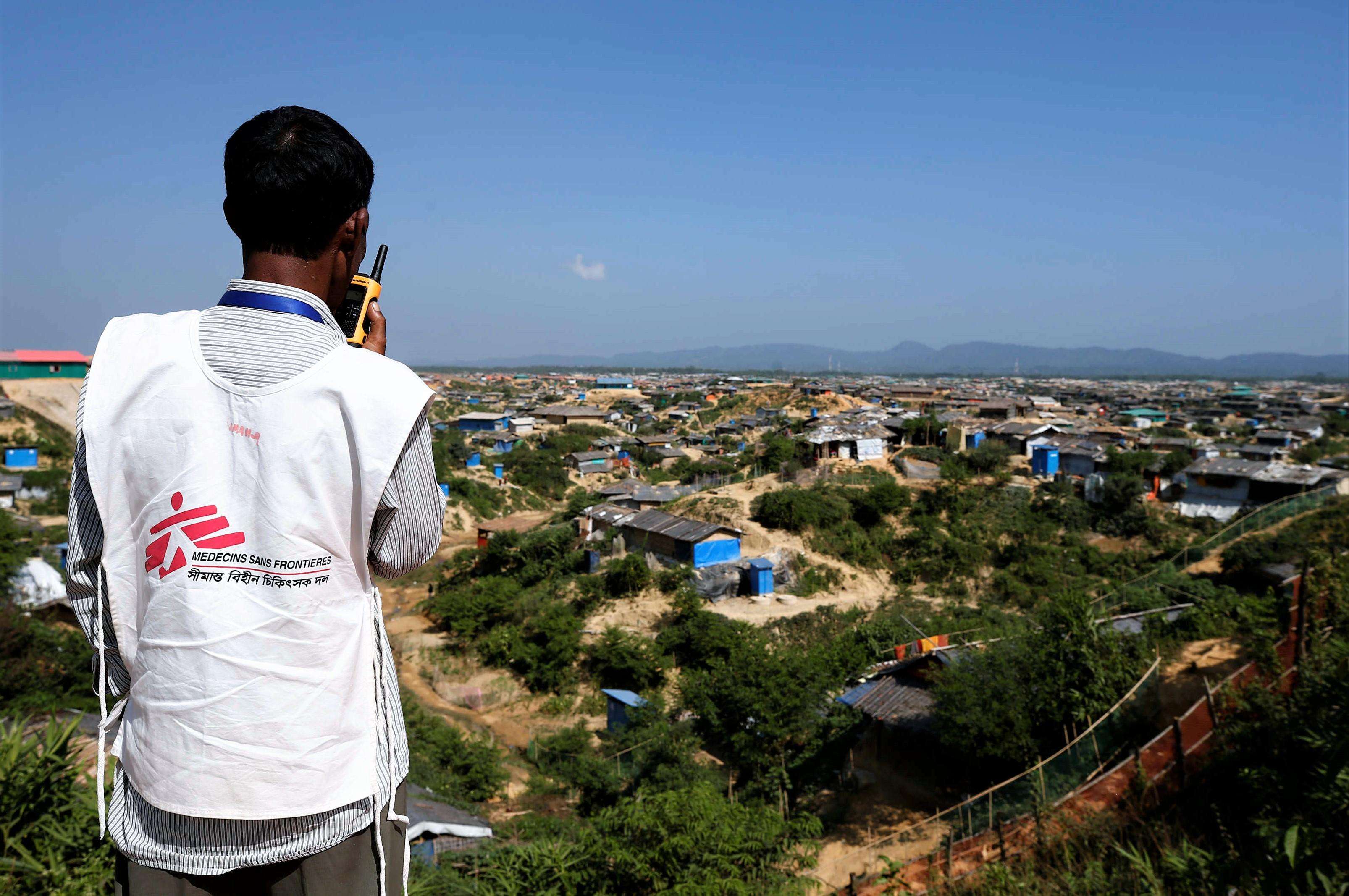 An MSF driver communicating with his walkie-talkie.