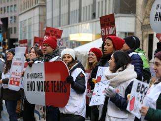 In front of the New York Stock Exchange, MSF demands J&J lower the price of the lifesaving TB drug bedaquiline following their US$82.1 billioin sales announcement.