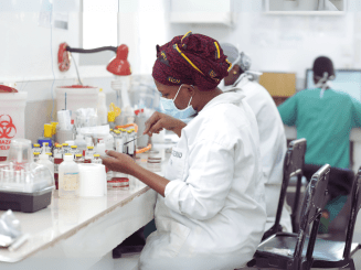 An MSF staff member in a laboratory.