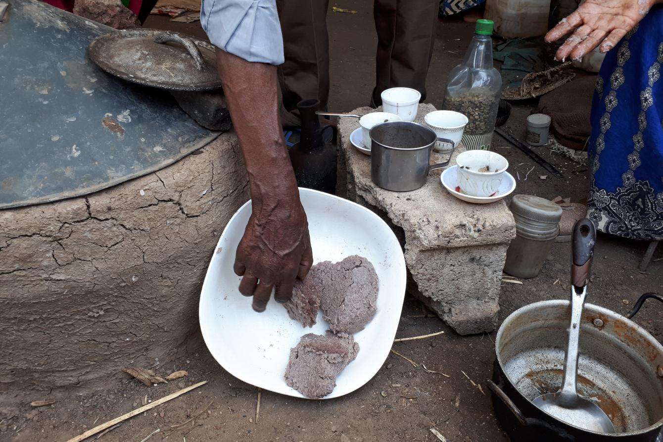 A plate of grey-pink food.