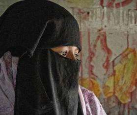 Profile of a Rohingya woman in a niqab in a camp in Cox's Bazar, Bangladesh