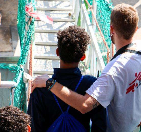 MSF teams receive a survivor of a boat in distress in the Mediterranean.